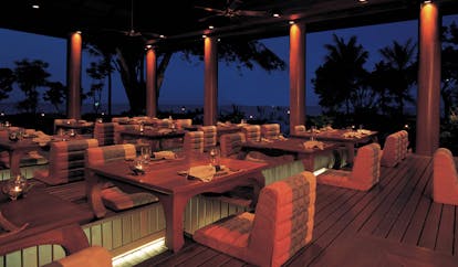 Hyatt Regency Hua Hin Thailand Talay Thai restaurant covered dining area comfy seating night time