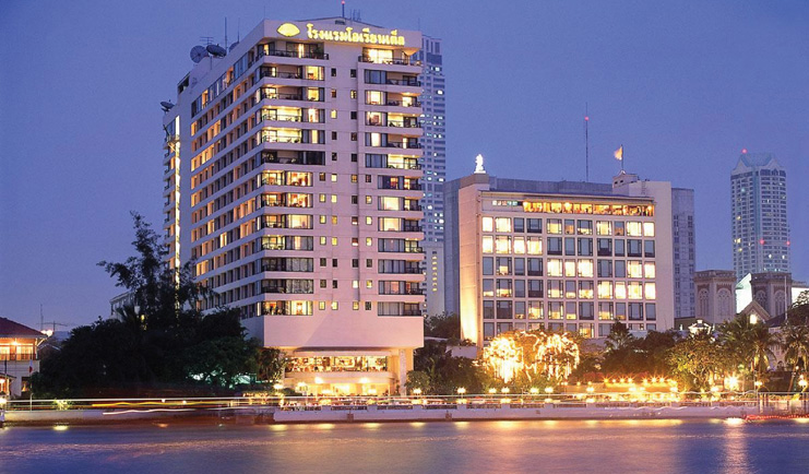 Mandarin Oriental Bangkok Thailand exterior large white building next to river