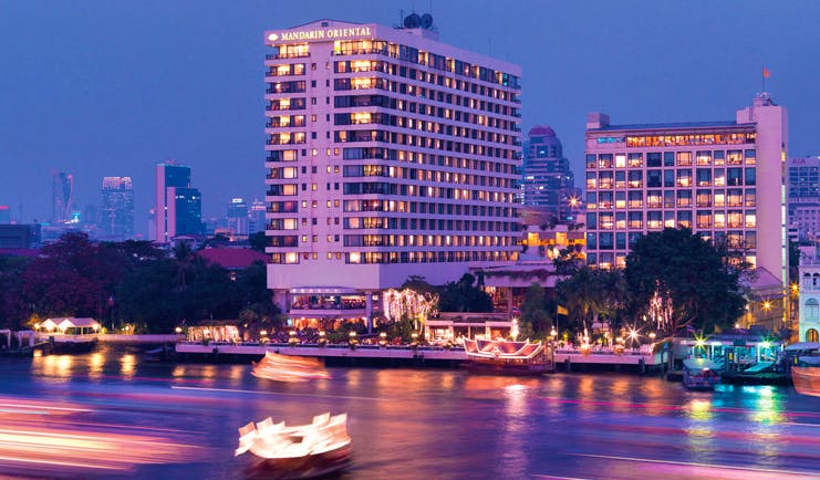 Mandarin Oriental Bangkok Thailand hotel exterior riverside view boats