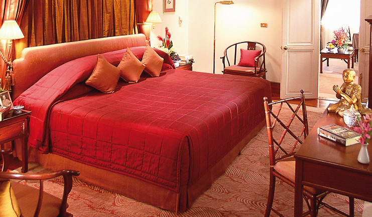 Mandarin Oriental Bangkok Thailand James Michener suite large bed buddha statue view to lounge