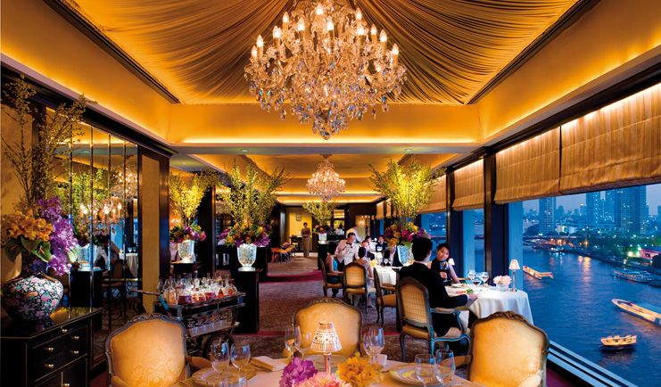 Mandarin Oriental Bangkok Thailand Le Normandie restaurant opulent decor chandelier floral arrangement river view
