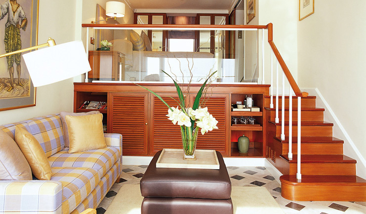 Mandarin Oriental Bangkok Thailand premier room mezzanine sitting area with steps to bed