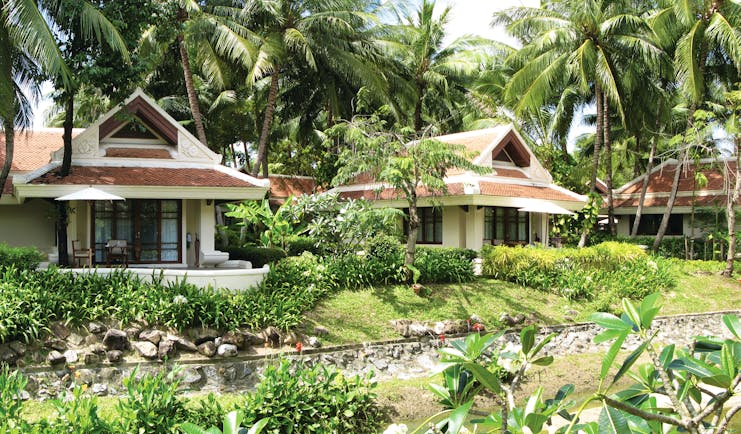 Santiburi Resort Thailand villa exteriors gardens lawns trees