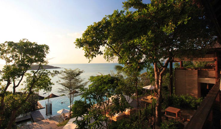 Six Senses Samui Thailand outdoor pool aerial view trees ocean view