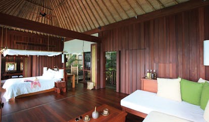Six Senses Samui Thailand pool suite white sofa wooden walls 