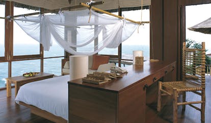 Six Senses Samui Thailand pool villa bedroom white mosquito drapes panoramic ocean view