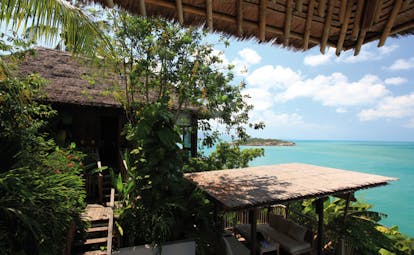 Six Senses Samui Thailand presidential villa view thatched rooves ocean view