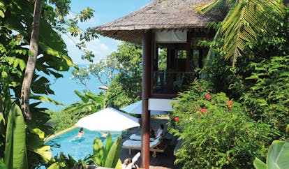 Six Senses Samui Thailand presidential villa exterior private pool loungers greenery