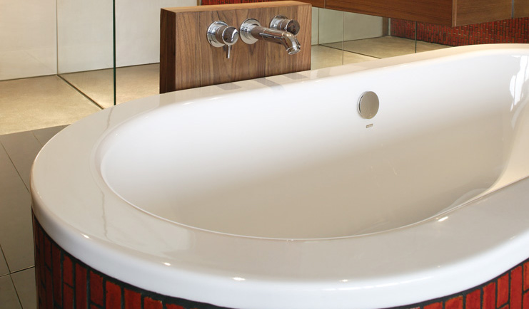 The Dhara Devi Thailand bathroom with wooden freestanding bath