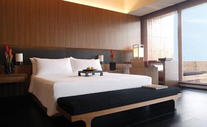 The Dhara Devi Thailand bedroom modern minimalist decor tray on bed