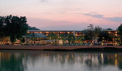 The Dhara Devi Thailand river view of the hotel at sunset