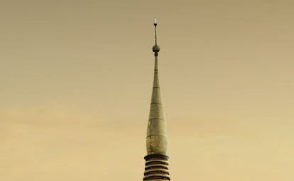 The Dhara Devi Thailand temple spire close up 
