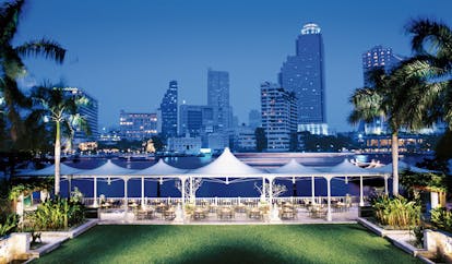 The Peninsula Bangkok Thailand lawns outdoor terrace dining aerial river and city views