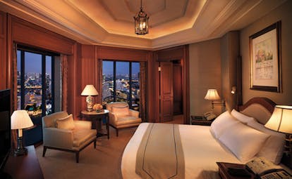 The Peninsula Bangkok Thailand peninsula suite bedroom classic decor panoramic city and river view