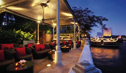 The Peninsula Bangkok Thailand River bar outdoor lounge area with sofas and river views