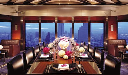 The Peninsula Bangkok Thailand river view restaurant dining room with panoramic river views