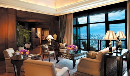 The Peninsula Bangkok Thailand suite lounge area with city views