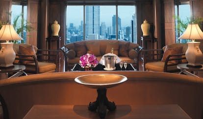 The Peninsula Bangkok Thailand Thai suite lounge sofas panoramic city views 