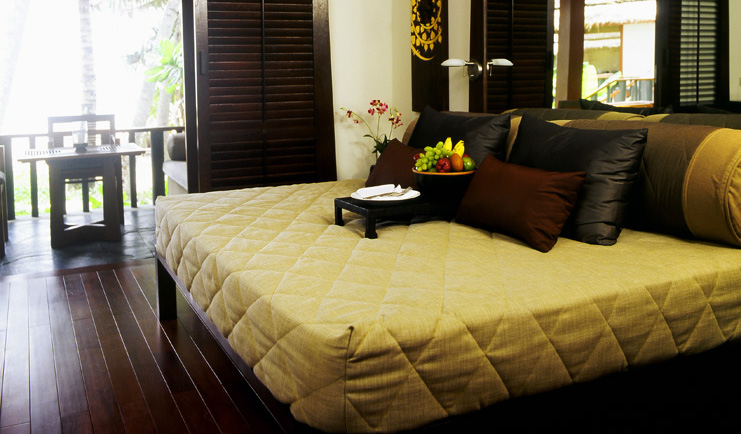 The Surin Phuket Thailand beach deluxe suite bedroom balcony view 