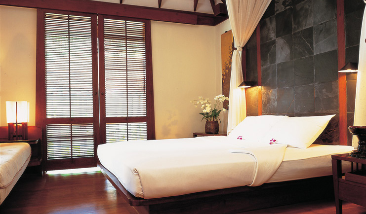 The Surin Phuket Thailand bedroom grey slate walls minimalist decor