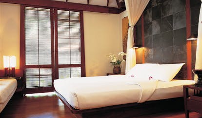 The Surin Phuket Thailand bedroom grey slate walls minimalist decor