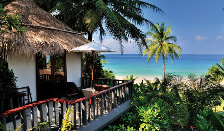 The Surin Phuket Thailand cottage sea view balcony palm trees 