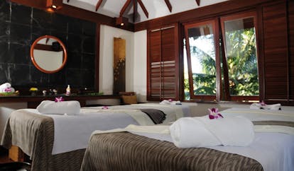 The Surin Phuket Thailand spa room two treatment beds modern decor