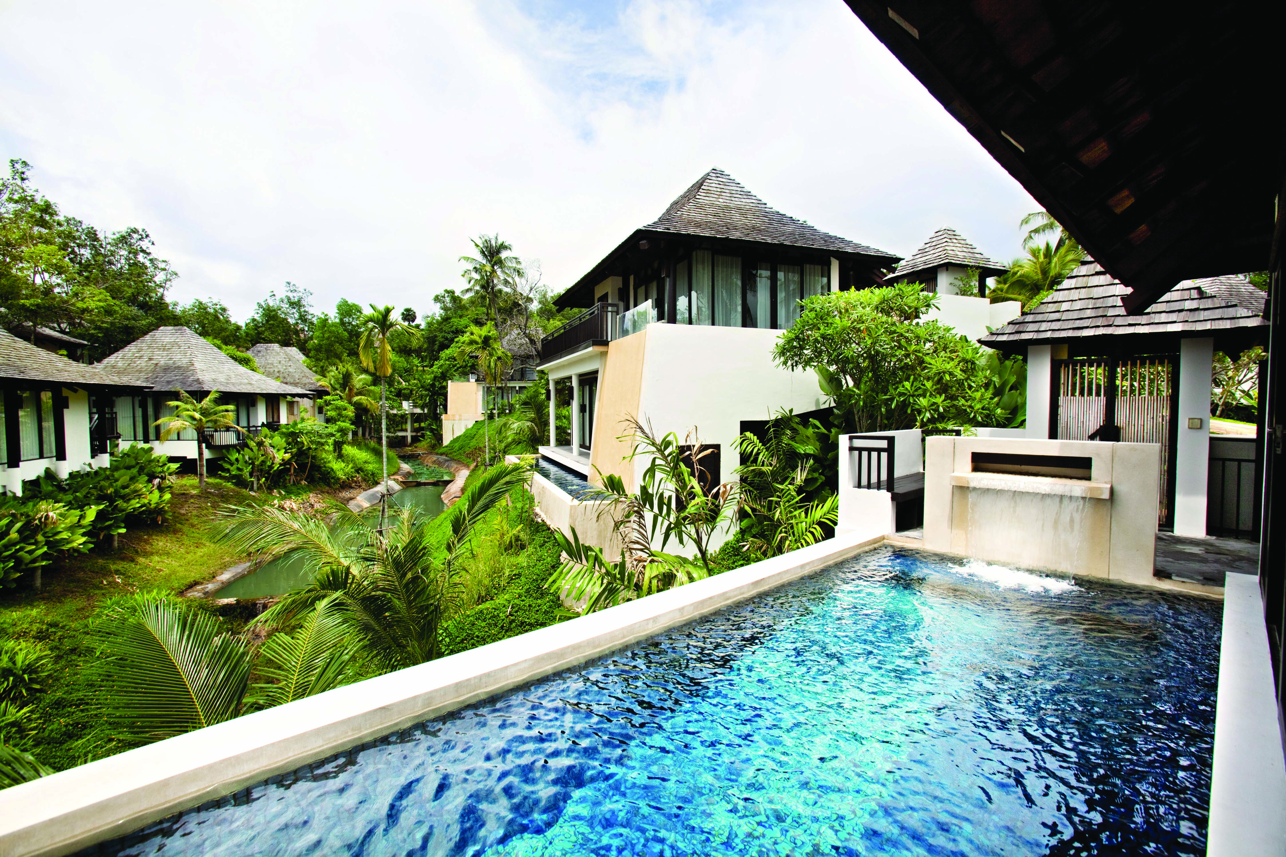 Vijitt Resort Thailand gardens view of gardens from pool terrace trees lawns