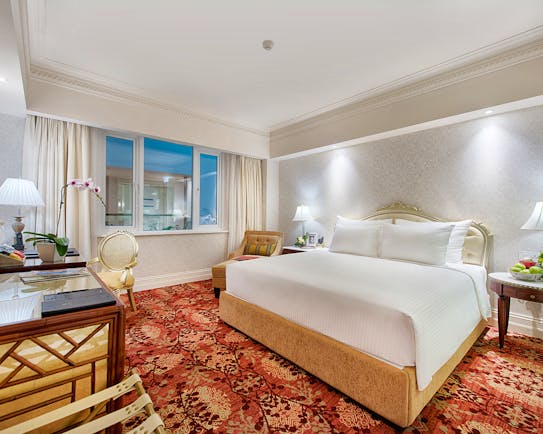 Apricot Hotel deluxe sketch room, double bed, desk, elegant decor