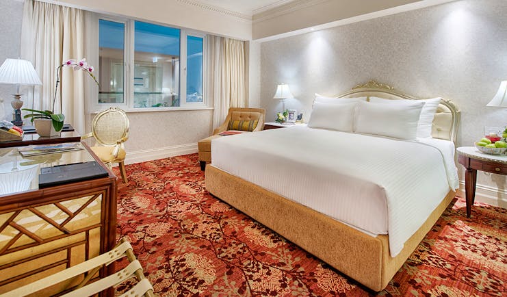 Apricot Hotel deluxe sketch room, double bed, desk, elegant decor