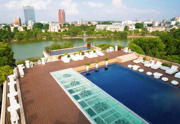 Apricot Hotel rooftop pool, sun loungers, view over river and city