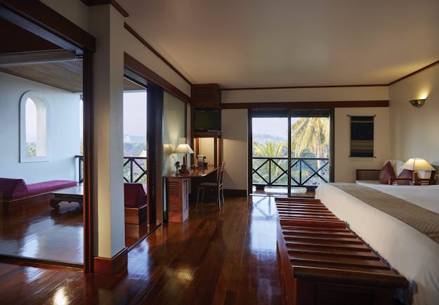 Belmond La Residence Phou Vao junior suite, traditional decor, balcony with mountain view