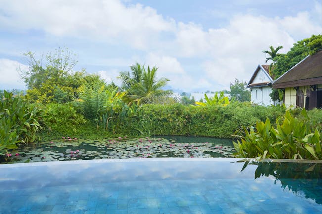 Belmond La Residence Phou Vao pool, overlooking pond