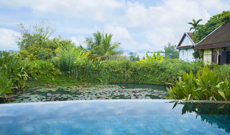 Belmond La Residence Phou Vao pool, overlooking pond