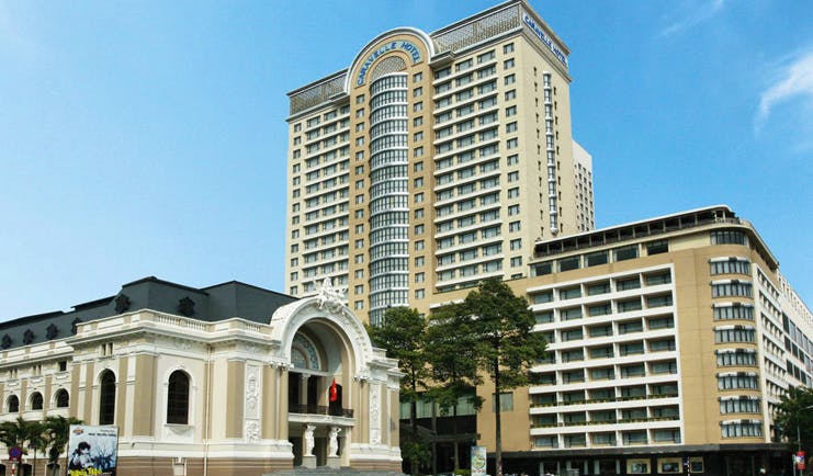 Caravelle Hotel Vietnam hotel exterior skyscraper next to white building