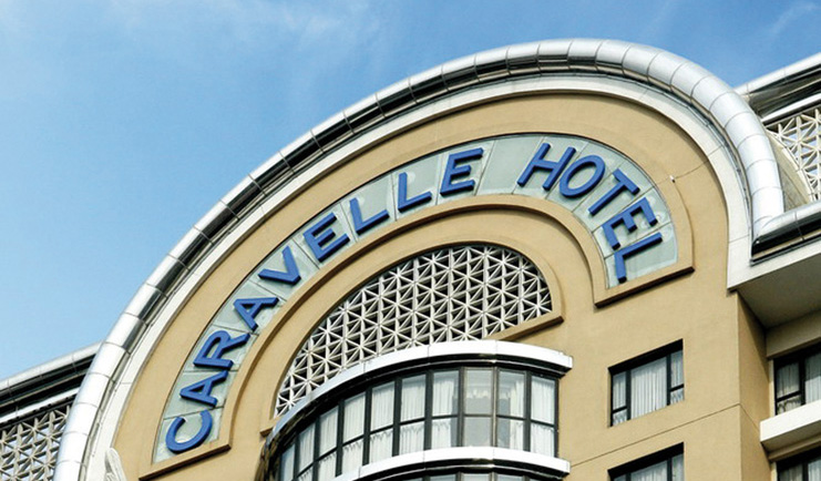 Caravelle Hotel Vietnam hotel sign reading 'Caravelle Hotel'