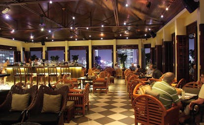 Caravelle Hotel Vietnam Saigon bar indoor bar area chequerboard flooring classic decor