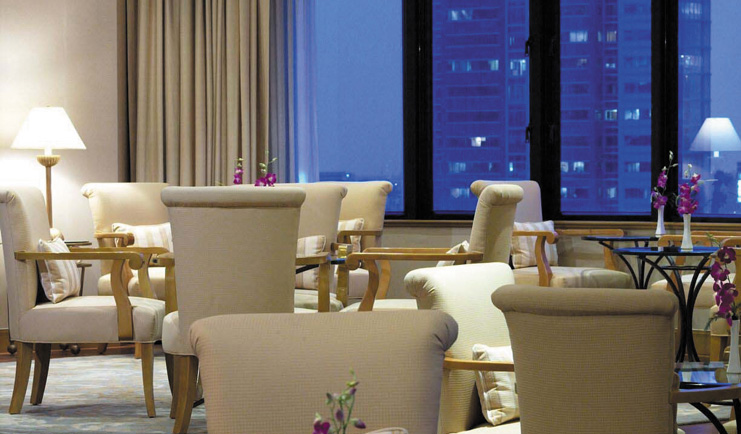 Caravelle Hotel Vietnam signature lounge seating area with city views