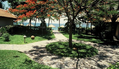 Evason Ana Mandara Resort Vietnam garden path to the beach and loungers
