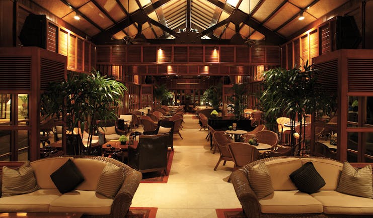 Furama Resort Vietnam lounge indoor communal seating area sofas authentic décor