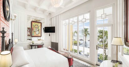 JW Marriott Phu Quoc Vietnam emerald bay guestroom bed elegant décor private balcony overlooking sea