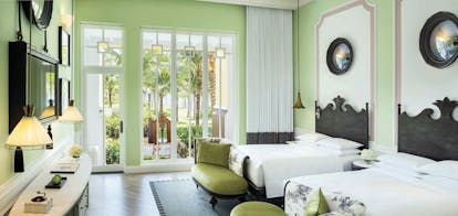 JW Marriott Phu Quoc Vietnam le jardin guestroom beds armchairs elegant décor garden views 