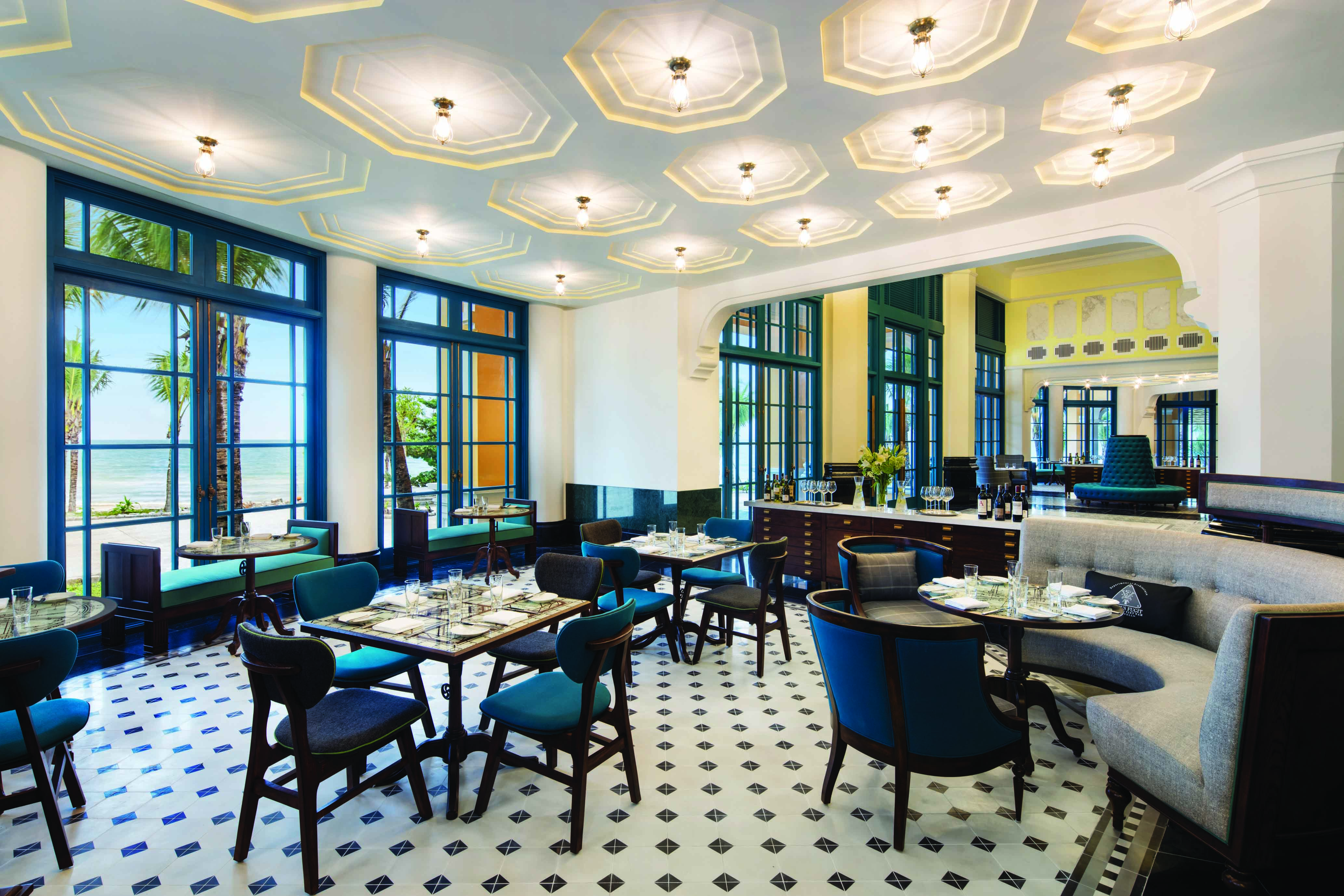 JW Marriott Phu Quoc Vietnam restaurant indoor dining area tables and chairs elegant décor