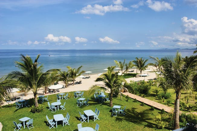 La Veranda Vietnam sandy beach sea sun loungers umbrellas 