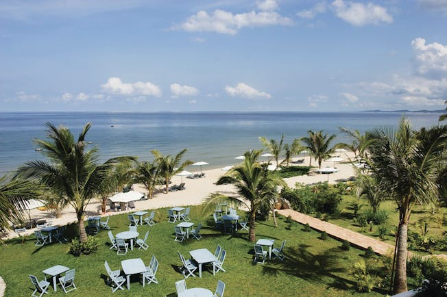 La Veranda Vietnam sandy beach sea sun loungers umbrellas 