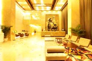 Liberty Central Saigon lobby, grand modern decor, reception desk, sofa, chairs