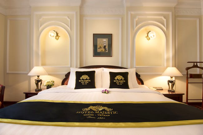 Majestic Hotel Saigon deluxe room, double bed, ornate decor