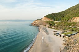 Mia Nha Trang Resort, beach, resort in secluded cove, villas beneath cliffside