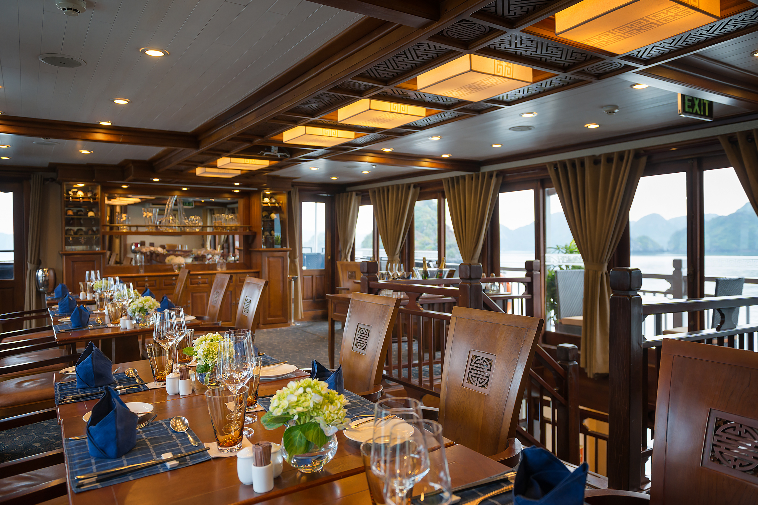 Paradise Peak Cruise restaurant on board, traditional decor, windows with views out to sea