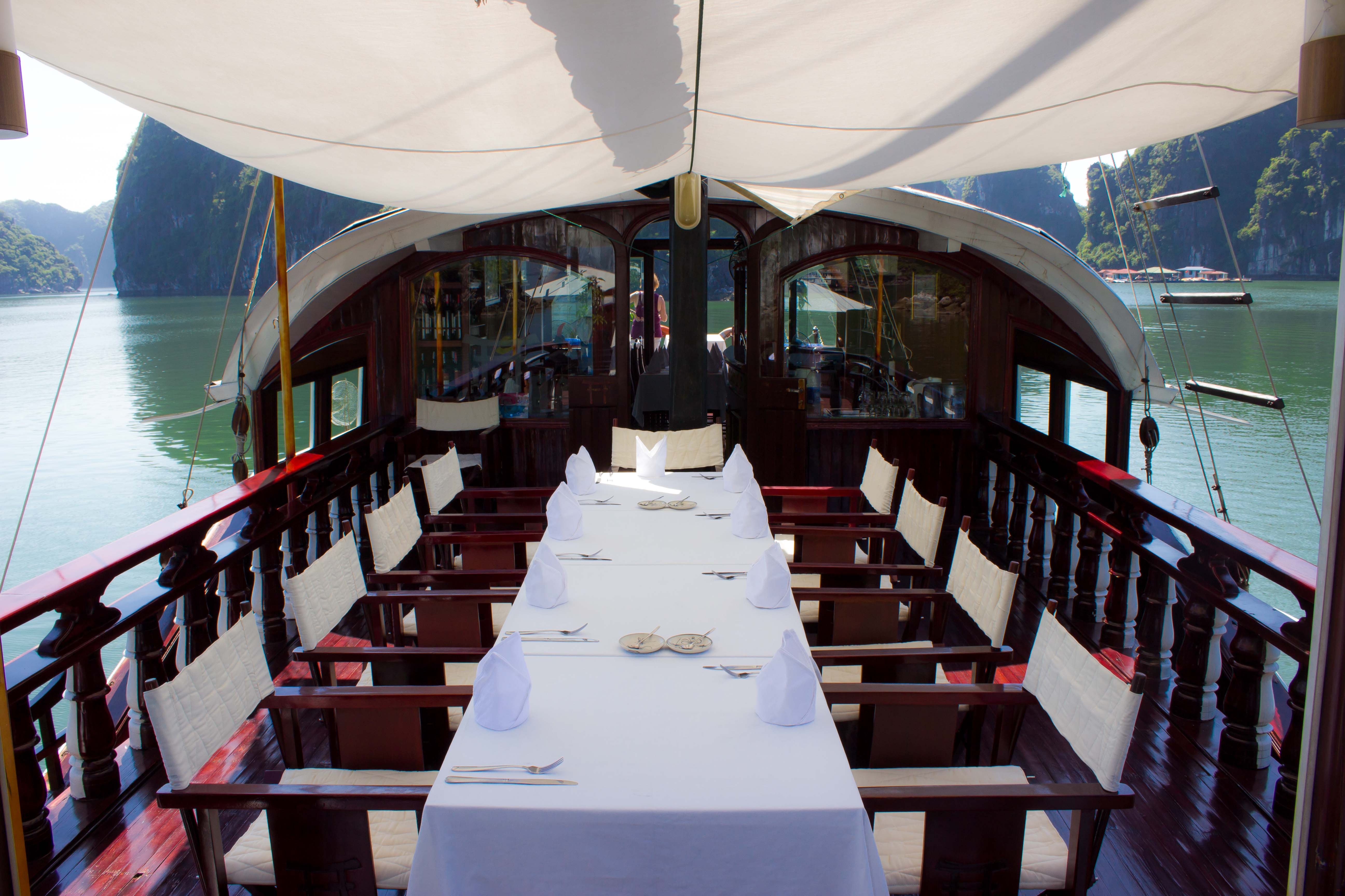 Red Dragon Junk canopied deck, dining area, views over water